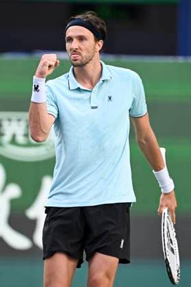 (251010) -- SHANGHAI, Oct. 10, 2025 -- Arthur Rinderknech of France celebrates scoring while competing against Felix Auger-Aliassime of Canada during the men s singles quarterfinal at the ATP, Tennis Herren World Tour Shanghai Masters tennis tournament in Shanghai, east China, Oct. 10, 2025. ) (SP)CHINA-SHANGHAI-TENNIS-ATP TOUR-SHANGHAI MASTERS-MEN S SINGLES (CN) ChenxHaoming 