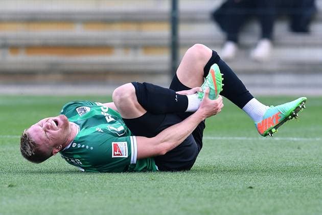 Soccer test match Borussia Mönchengladbach SC Preußen Münster on 10 10 2025 at the FohlenPlatz in Mönchengladbach Lars Lokotsch Münster injured on the ground xRx