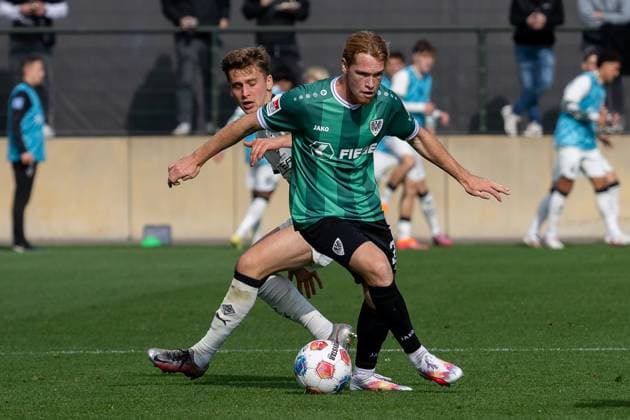 10 10 2025, Football friendly match, Borussia Moenchengladbach SC Preussen Muenster, season 2025 2026, Fohlenplatz at Borussia Park in Moenchengladbach duel between Oscar Fraulo Borussia Moenchengladbach, 22 and Luca Bolay SC Preussen Muenster, 25 Photo Kirchner Media Thomas Haesler Copyright: xKirchner-Media ThomasxHaeslerx