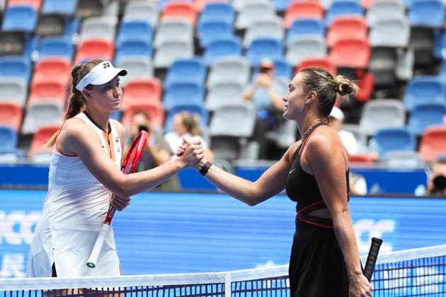 WUHAN, CHINA - OCTOBER 10: Aryna Sabalenka high-fives Elena Rybakina of Kazakhstan after the Women s Singles Quarterfinal match on day 7 of 2025 Wuhan Open at Optics Valley International Tennis Center on October 10, 2025 in Wuhan, Hubei Province of China.  Copyright: xVCGx 111596355515