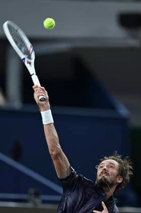(251010) -- SHANGHAI, Oct. 10, 2025 -- Daniil Medvedev serves during the men s singles quarterfinal between Daniil Medvedev of Russia and Alex de Minaur of Australia at the ATP, Tennis Herren World Tour Shanghai Masters tennis tournament in Shanghai, east China, Oct. 10, 2025. ) (SP)CHINA-SHANGHAI-TENNIS-ATP TOUR-SHANGHAI MASTERS-MEN S SINGLES (CN) ChenxHaoming 
