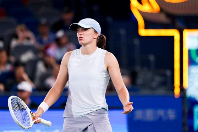 WUHAN, CHINA - OCTOBER 10: Iga Swiatek of Poland reacts in the Women s Singles Quarterfinal match against Jasmine Paolini of Italy on day 7 of 2025 Wuhan Open at Optics Valley International Tennis Center on October 10, 2025 in Wuhan, Hubei Province of China.  Copyright: xVCGx 111596398439
