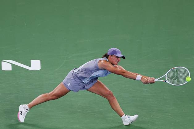 WUHAN, CHINA - OCTOBER 10: Iga Swiatek of Poland competes in the Women s Singles Quarterfinal match against Jasmine Paolini of Italy on day 7 of 2025 Wuhan Open at Optics Valley International Tennis Center on October 10, 2025 in Wuhan, Hubei Province of China.  Copyright: xVCGx 111596398474