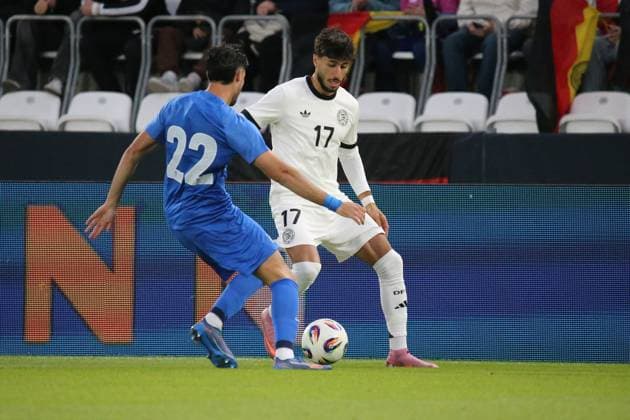 10 10 2025, xmohx, Football U 21 European Championship Qualification, Germany Greece v l Konstantinos Kostoulas Greece U21 Muhammed Damar German National Football Team DFB U21 duel, action, action, battle for the ball DFL DFB REGULATIONS PROHIBIT ANY USE OF PHOTOGRAPHS as IMAGE SEQUENCES and or QUASI VIDEO Jena