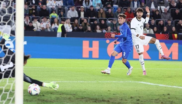 Germany Greece U21 European Championship Qualification Jena, 10 10 2025, Ernst Abbe Sportfeld, Soccer, International , U 21 Junior European Championship Qualification , Germany vs Greece , In the picture Goal for Germany Muhammed Damar 17, Germany scores to 1 21 against goalkeeper Nikolaos Botis 1, Greece , For editorial use only DFB UEFA regulations prohibit any use of photographs as image sequences and or quasi video , Picture Point