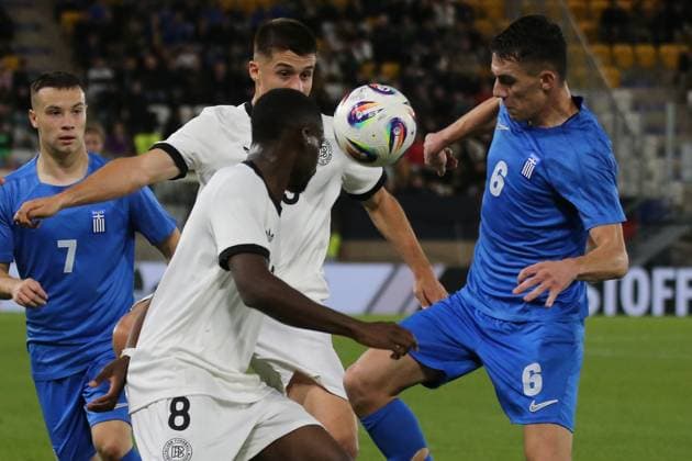 10 10 2025, xmohx, Football U 21 European Championship Qualification, Germany Greece v l Noel Aseko German National Football Team DFB U21 Nicolo Tresoldi German National Football Team DFB U21 Sotirios Kontouris Greece U21 duel, action, action, battle for the ball DFL DFB REGULATIONS PROHIBIT ANY USE OF PHOTOGRAPHS as IMAGE SEQUENCES and or QUASI VIDEO Jena