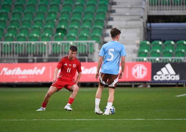 10th October 2025; Rodney Parade, Newport, Wales; Under 21 Euros Qualifying Football, Wales versus Belgium; Cameron Congreve of Wales takes on Matteo Dams of Belgium  AledxHopkins