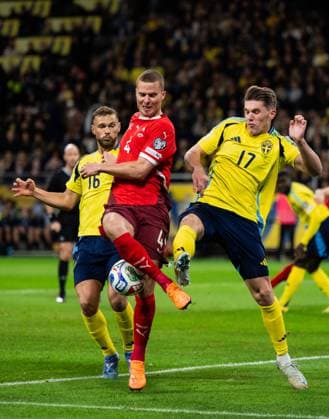 251010 Nico Elvedi of Switzerland, Jesper Karlström and Viktor Gyökeres of Sweden during the FIFA World Cup, WM, Weltmeisterschaft, Fussball Qualifier football match between Sweden and Switzerland on October 10, 2025 in Stockholm. Photo: Jesper Zerman BILDBYRAN kod JZ JM0740 bbeng fotboll football soccer fotball vm-kval kval fifa world cup qualifier qualifier qualification sverige sweden sverige a schweiz switzerlandbbauto sverige sweden  Copyright: JESPERxZERMAN BB251010JZ023