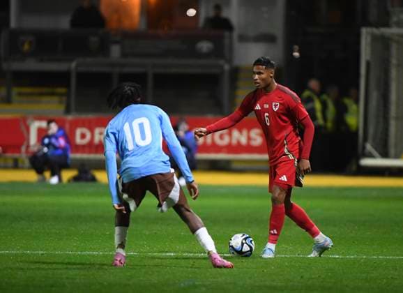 10th October 2025; Rodney Parade, Newport, Wales; Under 21 Euros Qualifying Football, Wales versus Belgium; Samuel Mbangula of Belgium pressures Kai Andrews of Wales  AledxHopkins