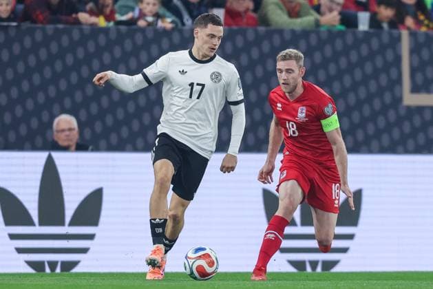 Soccer World Cup Qualification Germany Luxembourg on 10 10 2025 at the PreZero Arena in Sinsheim Florian Wirtz Germany , left Laurent Jans Luxembourg , right DFB regulations prohibit any use of photographs as image sequences and or quasi video xJRx