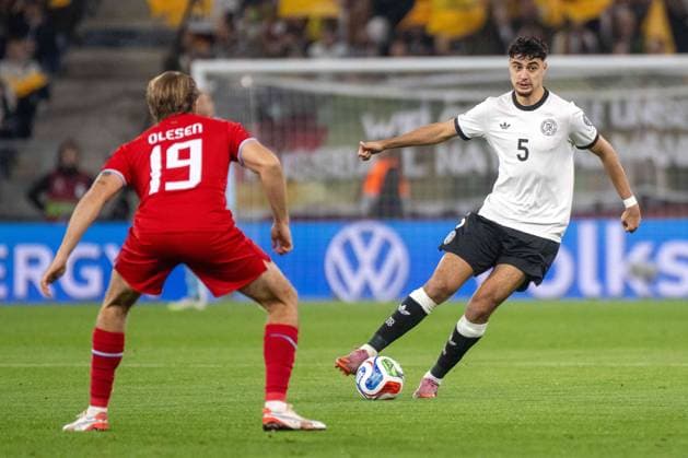 Alexsander Pavlovic GER and Mathias Olesen LUX xettx, Germany, Sinsheim, 10 10 2025, Football, National team, World Cup Qualification Europe Germany vs Luxembourg, Season 2025 2026, Matchday 7, PreZerro Arena