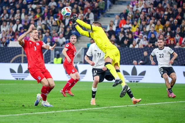 10 10 2025, Football, International match, Germany Luxembourg, UEFA World Cup Qualification, 2025 2026, Group A, PreZero Arena in Sinsheim Goalkeeper Anthony Moris T LUX 01 defends against Nick Woltemade GER 11 DFB regulations prohibit any use of photographs as image sequences and or quasi video Baden Württemberg Germany