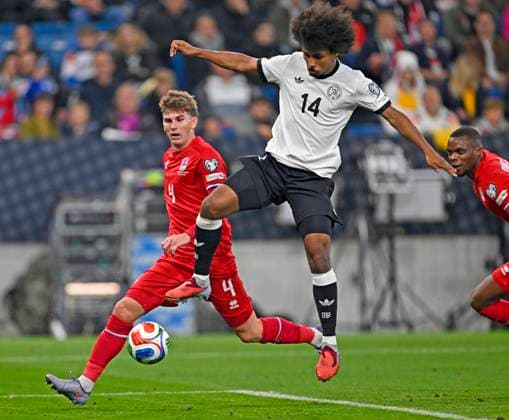 10 10 2025, Football World Cup Qualification Europe 2025 26, Matchday 7, Germany Luxembourg, in the PreZero Arena Sinsheim f l Florian Bohnert Luxembourg , Karim Adeyemi Germany and Christopher Martins Luxembourg