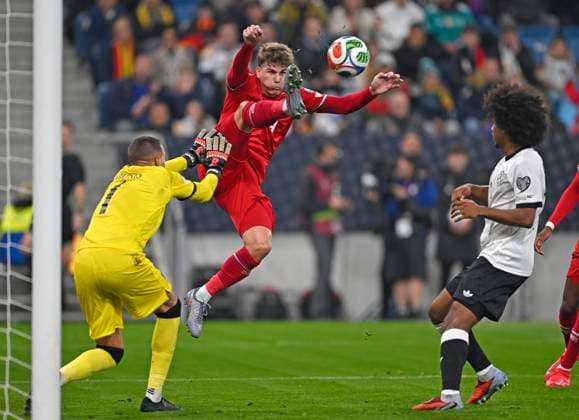 10 10 2025, Soccer World Cup Qualification Europe 2025 26, Matchday 7, Germany Luxembourg, in the PreZero Arena Sinsheim f l Goalkeeper Anthony Moris Luxembourg , Florian Bohnert Luxembourg and Karim Adeyemi Germany