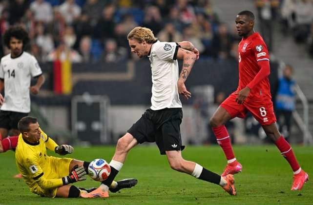 10 10 2025, Soccer World Cup Qualification Europe 2025 26, Matchday 7, Germany Luxembourg, in the PreZero Arena Sinsheim v l Goalkeeper Anthony Moris Luxembourg v Nick Woltemade Germany