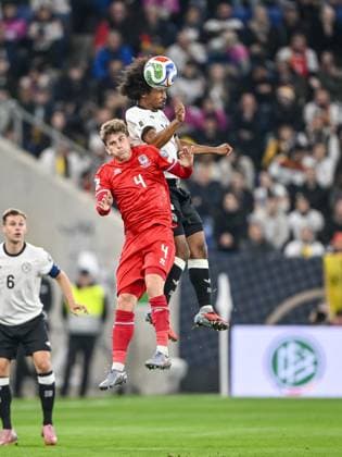 Florian Bohnert (Luxembourg) und Karim Adeyemi (Germany) battle for the ball during the FIFA World Cup, WM, Weltmeisterschaft, Fussball 2026 qualifier match between Germany and Luxembourg at PreZero-Arena on October 10, 2025 in Sinsheim, Germany. (Photo by Harry Langer DeFodi Images) Florian Bohnert Luxembourg and Karim Adeyemi Germany battle for the ball during the FIFA World Cup 2026 qualifier match between Germany and Luxembourg at PreZero Arena on October 10, 2025 in Sinsheim, Germany Photo by Harry Langer DeFodi Images