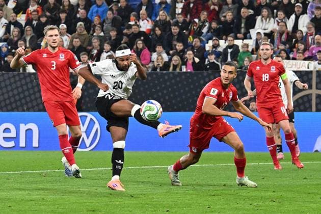 10 10 2025, xsltx, Football World Cup Qualification 2026, Germany Luxembourg v l Serge Gnabry German National Football Team DFB Dirk Carlson Luxembourg duel, action, action, battle for the ball DFL DFB REGULATIONS PROHIBIT ANY USE OF PHOTOGRAPHS as IMAGE SEQUENCES and or QUASI VIDEO Sinsheim