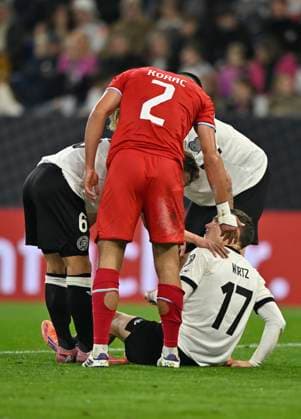 Florian Wirtz GER 17 injured Injury on the ground Seid Korac LUX LUX 02 DFB Laenderspiel Germany GER vs Luxembourg LUX World Cup Qualifiers European Qualifiers 10 10 2025 DFL REGULATIONS PROHIBIT ANY USE OF PHOTOGRAPHS AS IMAGE SEQUENCES AND OR QUASI VIDEO DFB Laenderspiel Germany GER vs Luxembourg LUX