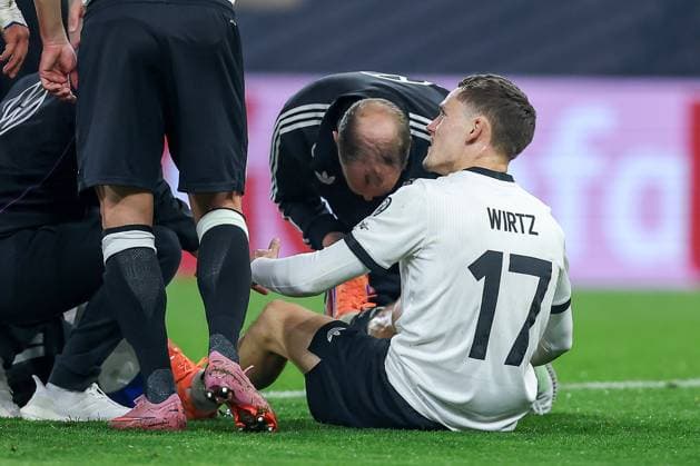 10 10 2025, Football, International match, Germany Luxembourg, UEFA World Cup Qualification, 2025 2026, Group A, PreZero Arena in Sinsheim Florian Wirtz GER 17 lies on the pitch in pain and requires medical attention DFB regulations prohibit any use of photographs as image sequences and or quasi video Baden Württemberg Germany