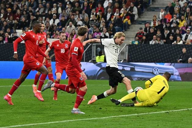 10 10 2025, xsltx, Football World Cup Qualification 2026, Germany Luxembourg v l Nick Woltermade German National Football Team DFB Anthony Moris Luxembourg duel, action, action, battle for the ball DFL DFB REGULATIONS PROHIBIT ANY USE OF PHOTOGRAPHS as IMAGE SEQUENCES and or QUASI VIDEO Sinsheim
