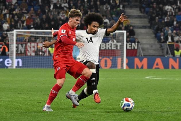 10 10 2025, xsltx, Football World Cup Qualification 2026, Germany Luxembourg v l Karim Adeyemi German National Football Team DFB Florian Bohnert Luxembourg duel, action, action, battle for the ball DFL DFB REGULATIONS PROHIBIT ANY USE OF PHOTOGRAPHS as IMAGE SEQUENCES and or QUASI VIDEO Sinsheim