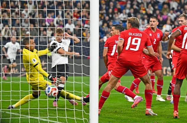 10 10 2025, Soccer World Cup Qualification Europe 2025 26, Matchday 7, Germany Luxembourg, at PreZero Arena Sinsheim Joshua Kimmich Germany scores 4-0 against goalkeeper Anthony Moris Luxembourg