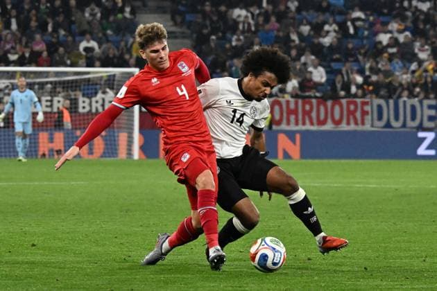10 10 2025, xsltx, Football World Cup Qualification 2026, Germany Luxembourg v l Karim Adeyemi German National Football Team DFB Florian Bohnert Luxembourg duel, action, action, battle for the ball DFL DFB REGULATIONS PROHIBIT ANY USE OF PHOTOGRAPHS as IMAGE SEQUENCES and or QUASI VIDEO Sinsheim