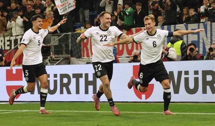 Sinsheim , Soccer international World Cup qualifier Europe , Germany vs. Luxembourg , Cheering after goal to 4 0 , from left Aleksandar Pavlovic David Raum Goalscorer Joshua Kimmich