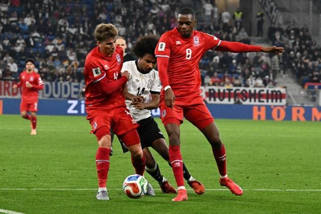 10 10 2025, xsltx, Football World Cup Qualification 2026, Germany Luxembourg v l Karim Adeyemi German National Football Team DFB Florian Bohnert Luxembourg duel, action, action, battle for the ball Christopher Martins Luxembourg DFL DFB REGULATIONS PROHIBIT ANY USE OF PHOTOGRAPHS as IMAGE SEQUENCES and or QUASI VIDEO Sinsheim