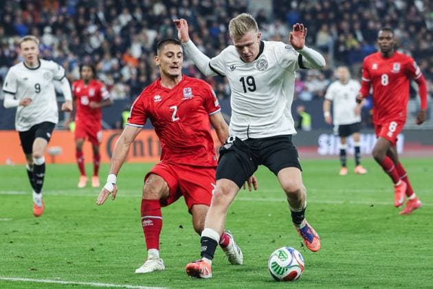 Soccer World Cup Qualification Germany Luxembourg on 10 10 2025 at the PreZero Arena in Sinsheim Seid Korac Luxembourg , left Jonathan Burkardt Germany , right DFB regulations prohibit any use of photographs as image sequences and or quasi video xJRx