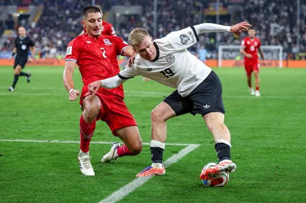 10 10 2025, Football, International match, Germany Luxembourg, UEFA World Cup Qualification, 2025 2026, Group A, PreZero Arena in Sinsheim Seid Korac LUX 02 in duel against Jonathan Burkhardt GER 19 DFB regulations prohibit any use of photographs as image sequences and or quasi video Baden Württemberg Germany