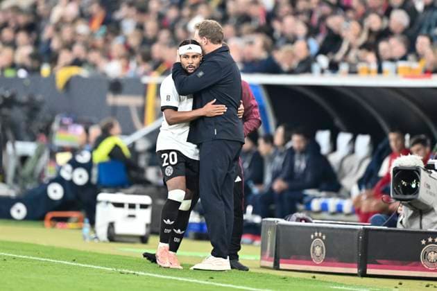 Julian Nagelsmann Germany Coach presses Serge Gnabry Germany 20 on substitution 10 10 2025 Soccer World Cup Qualification Germany vs Luxembourg , PreZero Arena, Sinsheim, Copyright: xpepphotox xHorstxMauelshagenx pep00321, pep_20251010_hm_160275