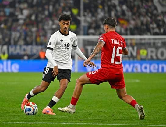 10 10 2025, Football World Cup Qualification Europe 2025 26, Matchday 7, Germany Luxembourg, in the PreZero Arena Sinsheim v l Nathaniel Brown Germany v Olivier Thill Luxembourg