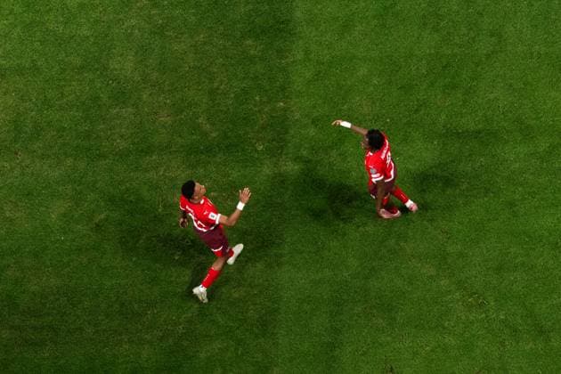 251010 Johan Manzambi of Switzerland celebrates with Dan Ndoye after 0 2 during the FIFA World Cup Qualifier football match between Sweden and Switzerland on October 10, 2025 in Stockholm Photo Emma Wallskog BILDBYRAN COP 320 JM0740 bbeng fotboll football soccer fotball vm kval kval fifa world cup qualifier qualifier qualification sverige sweden sverige a schweiz switzerland jubel  Copyright: EMMAxWALLSKOG BB251010EW020