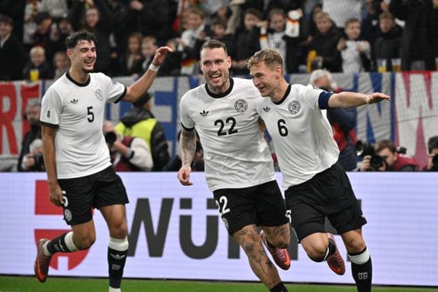 Cheers 4 0 v re , Joshua Kimmich Germany , David Raum Germany , Aleksandar Pavlovic Germany 10 10 2025, FIFA World Cup Qualification Europe 2025 26, 7 Matchday Germany Luxembourg Sinsheim PreZero Arena Nordrhein Westfalen Germany Team2