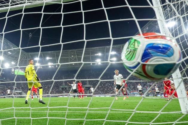 10 10 2025, Soccer, International match, Germany Luxembourg, UEFA World Cup Qualification, 2025 2026, Group A, PreZero Arena in Sinsheim Goal kick The ball hits the goal Goal celebration after the 1 0 goal by scorer Nadiem Amiri GER 10 Backdoor camera Goal DFB regulations prohibit any use of photographs as image sequences and or quasi video Baden Württemberg Germany
