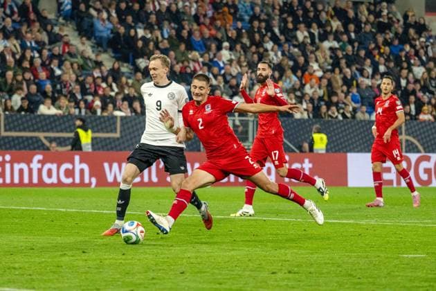 Maximilian Beier GER in duel with Seid Korac LUX xettx, Germany, Sinsheim, 10 10 2025, Soccer, National team, World Cup Qualification Europe Germany vs Luxembourg, Season 2025 2026, Matchday 7, PreZerro Arena