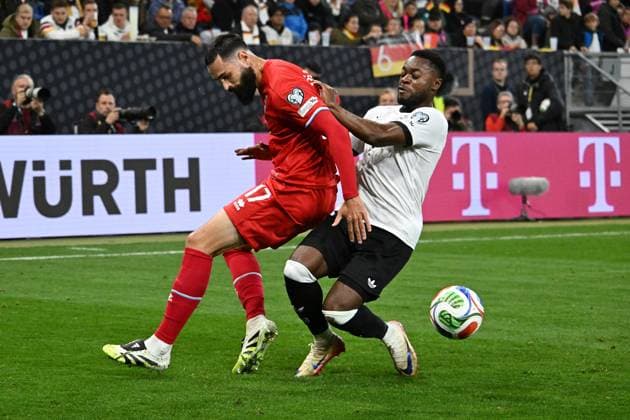 10 10 2025, xsltx, Football World Cup Qualification 2026, Germany Luxembourg v l Vahid Selimovic Luxembourg Ridle Baku German National Football Team DFB Zweikampf, Aktion, action, battle for the ball DFL DFB REGULATIONS PROHIBIT ANY USE OF PHOTOGRAPHS as IMAGE SEQUENCES and or QUASI VIDEO Sinsheim