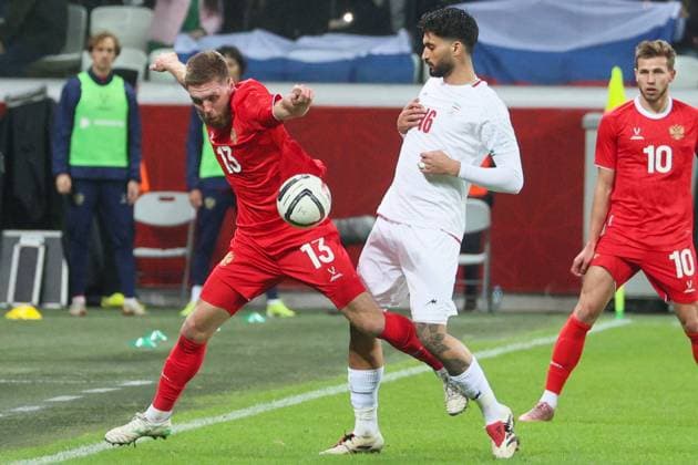 RUSSIA, VOLGOGRAD - OCTOBER 10, 2025: Russia s Ivan Sergeyev (L) and Iran s Mohammad Ghorbani are in action in a friendly football match between the Russian and the Iranian men s national football teams at Volgograd Arena. Dmitry Rogulin TASS  84736977