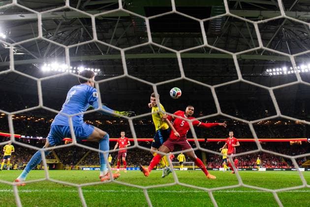 251010 Goalkeeper Gregor Kobel and Manuel Akanji of Switzerland are being challenged by Viktor Gyökeres of Sweden during the FIFA World Cup Qualifier football match between Sweden and Switzerland on October 10, 2025 in Stockholm Photo Joel Marklund BILDBYRAN kod JM JM0740 bbeng fotboll football soccer fotball vm kval kval fifa world cup qualifier qualifier qualification sverige sweden sverige a schweiz switzerland  Copyright: JOELxMARKLUND BB251010JM133