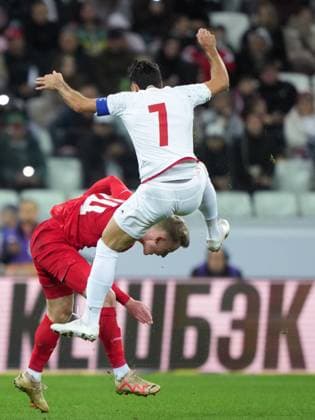 Russia Soccer Friendly Russia - Iran 9023722 10.10.2025 Russia s Viktor Melekhin and Iran s Alireza Jahanbakhsh collide as they struggle for the ball during the friendly soccer match between Russia and Iran, in Volgograd, Russia. Alexander Vilf Sputnik Volgograd Russia  Copyright: xAlexanderxVilfx