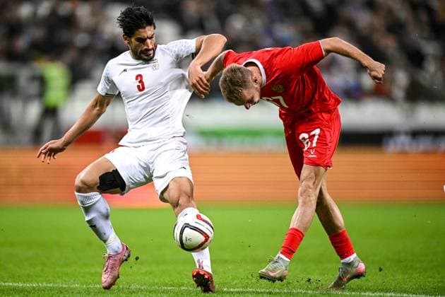 Russia Soccer Friendly Russia - Iran 9023804 10.10.2025 Iran s Hossein Abarghouei and Russia s Maksim Glushenkov struggle for the ball during the friendly soccer match between Russia and Iran, in Volgograd, Russia. Sergey Bobylev Sputnik Volgograd Russia  Copyright: xSergeyxBobylevx