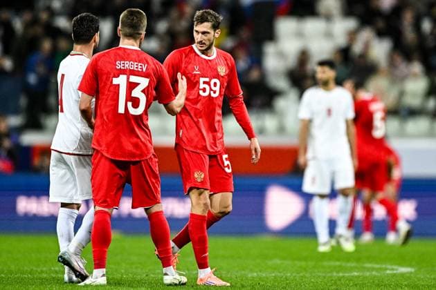 Russia Soccer Friendly Russia - Iran 9023816 10.10.2025 Iran s Shoja Khalilzadeh, Russia s Ivan Sergeev and Russia s Aleksey Miranchuk shake hands after the friendly soccer match between Russia and Iran, in Volgograd, Russia. Sergey Bobylev Sputnik Volgograd Russia  Copyright: xSergeyxBobylevx