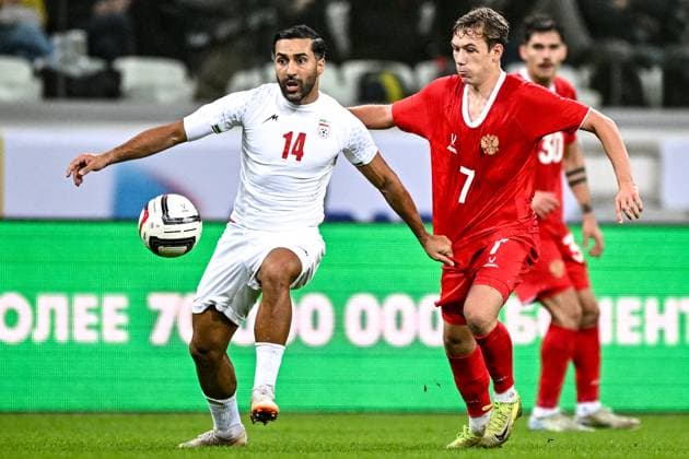 Russia Soccer Friendly Russia - Iran 9023835 10.10.2025 Iran s Saman Ghoddos and Russia s Aleksey Batrakov struggle for the ball during the friendly soccer match between Russia and Iran, in Volgograd, Russia. Sergey Bobylev Sputnik Volgograd Russia  Copyright: xSergeyxBobylevx