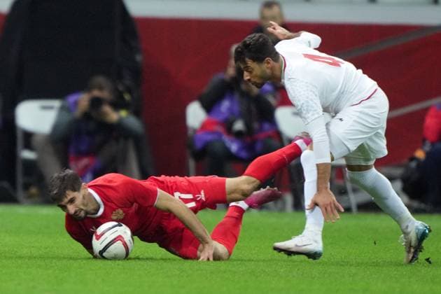 Russia Soccer Friendly Russia - Iran 9023851 10.10.2025 Russia s Zelimkhan Bakaev falls as he struggles for the ball against Iran s Shoja Khalilzadeh during the friendly soccer match between Russia and Iran, in Volgograd, Russia. Alexander Vilf Sputnik Volgograd Russia  Copyright: xAlexanderxVilfx