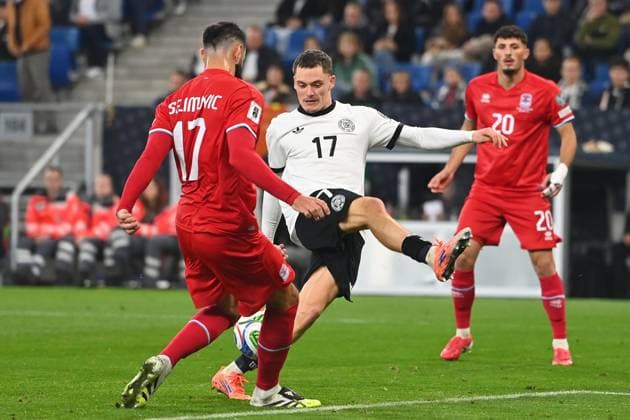 Florian WIRTZ GER , Action,tackle against Vahid Selimovic LUX ,penalty area scene Soccer international, World Cup Qualification Group A Matchday 07 Germany GER Luxembourg LU 4 0 on 10 10 2025, PreZero Arena Sinsheim