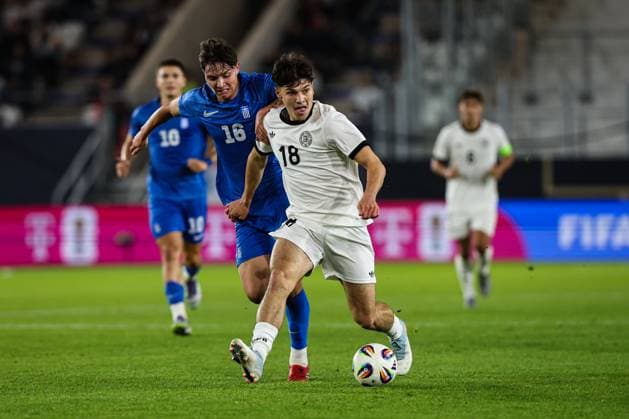 Mert Kömür Germany,18 vs Georgios Katris Greece,16 European Championship qualification U 21 Group F international match Germany vs Greece in the ad hoc Arena at the Ernst Abbe Sportfeld in Jena action,soccer,man,men,Germany,10 10 2025