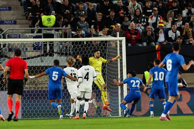 Goalscorer Konstantinos Kostoulas Greece,22 scores to 0 1 against goalkeeper Dennis Seimen Germany,1 European Championship qualification U 21 Group F international match Germany vs Greece in the ad hoc Arena at the Ernst Abbe Sportfeld in Jena action,soccer,man,men,Germany,10 10 2025