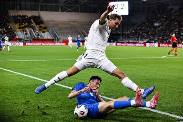 Nelson Weiper Germany,11 vs Sotiris Kontouris Greece,6 European Championship qualification U 21 Group F international match Germany vs Greece in the ad hoc Arena at the Ernst Abbe Sportfeld in Jena action,soccer,man,men,Germany,10 10 2025