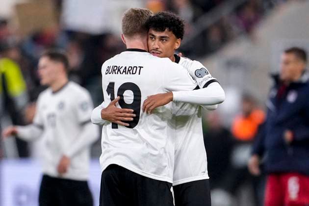v li Jonathan Burkardt Germany, 19 , Nathaniel Brown Germany, 18 , German national player, player of the German selection DFB Team , cheering after the final whistle, joy about the victory, winner, winner, cheers, cheering, cheerful, positive, happy, optimistic, highlight, action, action, 10 10 2025, Sinsheim Germany , football, World Cup qualification, Germany Luxembourg, THE EVENT REGULATIONS PROHIBIT ANY USE OF PHOTOGRAPHS AS IMAGE SEQUENCES AND OR QUASI VIDEOS xozx